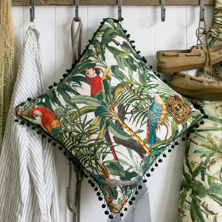 Parrots Of Brasil Linen Cushion by Mind the Gap Designer Pillow THE TROPICAL COTTAGE 100% Linen Made in United Kingdom Black POM POM border 20 x 20 in - Swanky Fabrics -