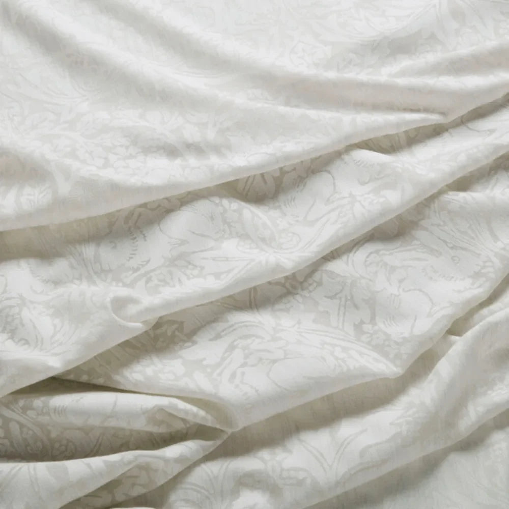 7915 Brother Rabbit Sheer 2 Linen by Wmah Designer Fabric 7915 Brother Rabbit Sheer 2 Linen by Wmah Fabric WILLIAM MORRIS AT HOME DOVECOTE VOL 1 63%POL 34%SVI 3%LIN Turkey Horizontal: 12.5 and Vertical: 20 118 in - Fabric Carolina -
