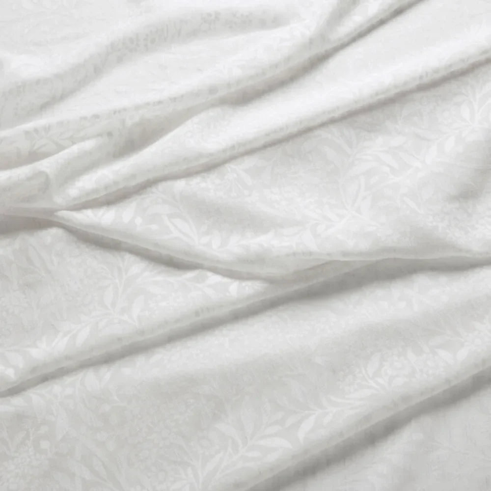 7919 Michaelmas Daisy Sheer 1 Snow by Wmah Designer Fabric 7919 Michaelmas Daisy Sheer 1 Snow by Wmah Fabric WILLIAM MORRIS AT HOME DOVECOTE VOL 1 67%POL 31%SVI 2%LIN Turkey Horizontal: 12.5 and Vertical: 20 120 in - Fabric Carolina -