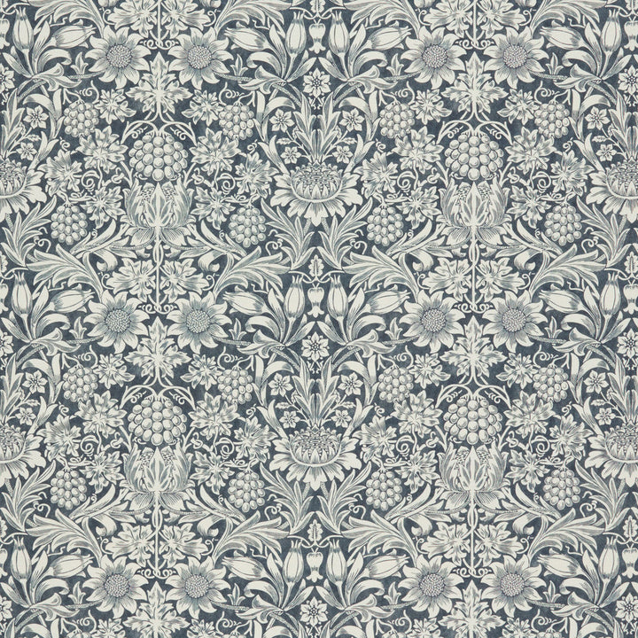 7867 Sunflower 2 Ink by Wmah Fabric Wmah Fabric 7867 Sunflower 2 InkFabric WILLIAM MORRIS AT HOME KELMSCOTT GARDENS VOL 1 100%COT SPAIN </p><p>Repeat: H: 18.500, V: 15.375 55 in - Fabric Carolina -