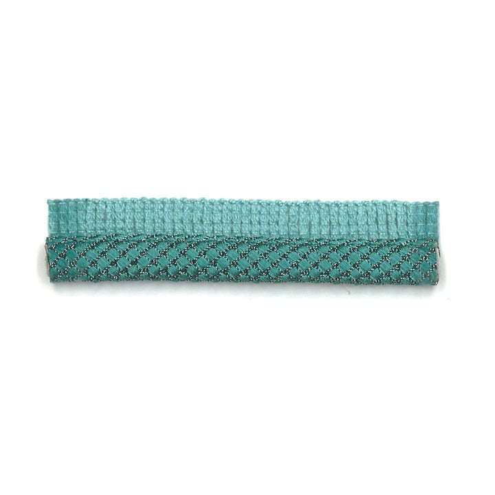 Dimaggio 5 Turquoise by Stout Trim Stout Trim Dimaggio 5 TurquoiseTrim NEW WORLD TRIM VOLUME II 69%SVI 30%COT 1%POL GERMANY </p><p>Repeat: H: 0.000, V: 0.000 0.38 in - Fabric Carolina -