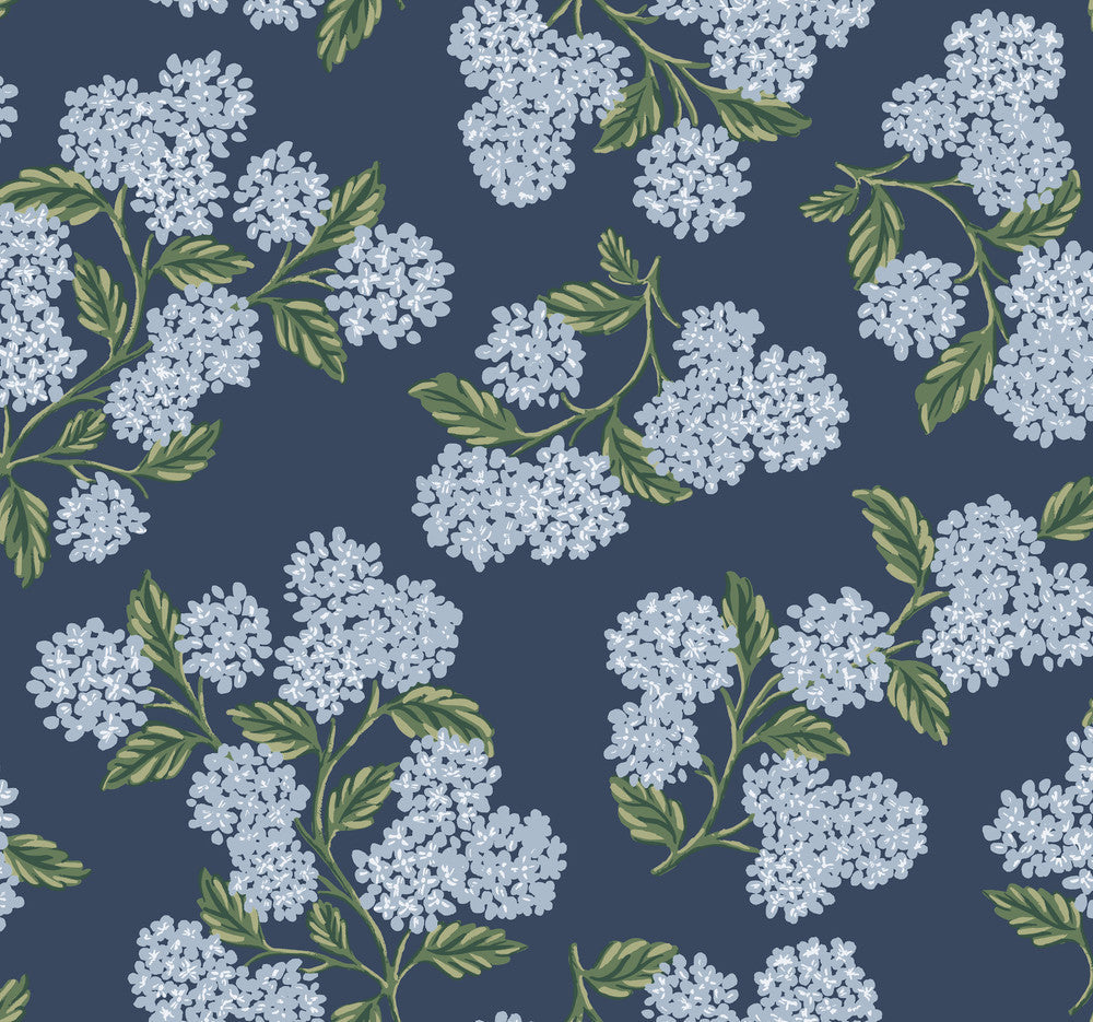 Hydrangea Navy Wallpaper by Rifle Paper Co. Designer Rifle Paper Co. Covers about 60.8 square feet 27-in by 27-ft long roll Unpasted 25.25 - Swanky Fabrics -