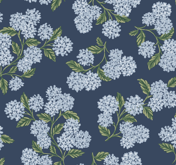 Hydrangea Navy Wallpaper by Rifle Paper Co. Designer Rifle Paper Co. Covers about 60.8 square feet 27-in by 27-ft long roll Unpasted 25.25 - Swanky Fabrics -