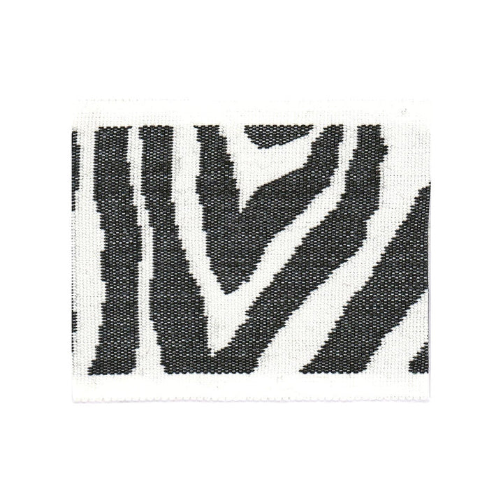 Safari Tape 1 Domino by Stout Trim Stout Trim Safari Tape 1 DominoTrim BEACH GROVE TRIM 100%SDA CHINA </p><p>Repeat: H: 8.000, V: 0.000 3.13 in - Fabric Carolina -
