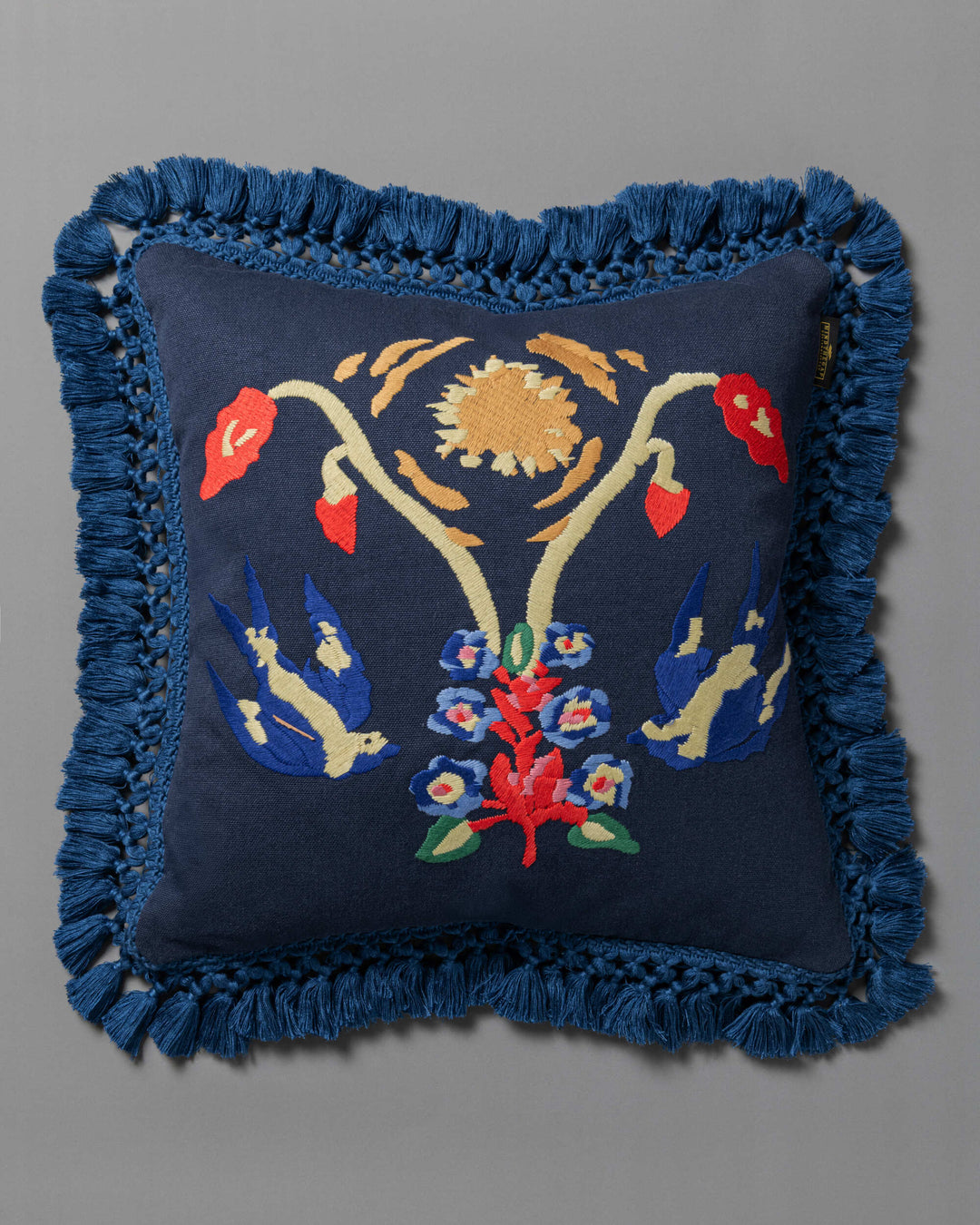 A Swallow's Horizon embroidered cushion pillow by Mind the Gap (LC40265), front