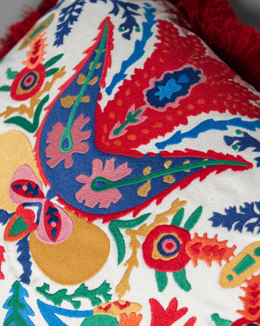 EUFLORIA embroidered cushion (LC40267) by Mind The Gap | LC40267 | TRANSYLVANIAN RHAPSODY | 50 x 50 cm / 20 x 20 in | Blue, White, Yellow, Red | Fringes all around | Duck feather | 20% PA, 80% LI | Fabric Carolina | https://www.fabriccarolina.com/