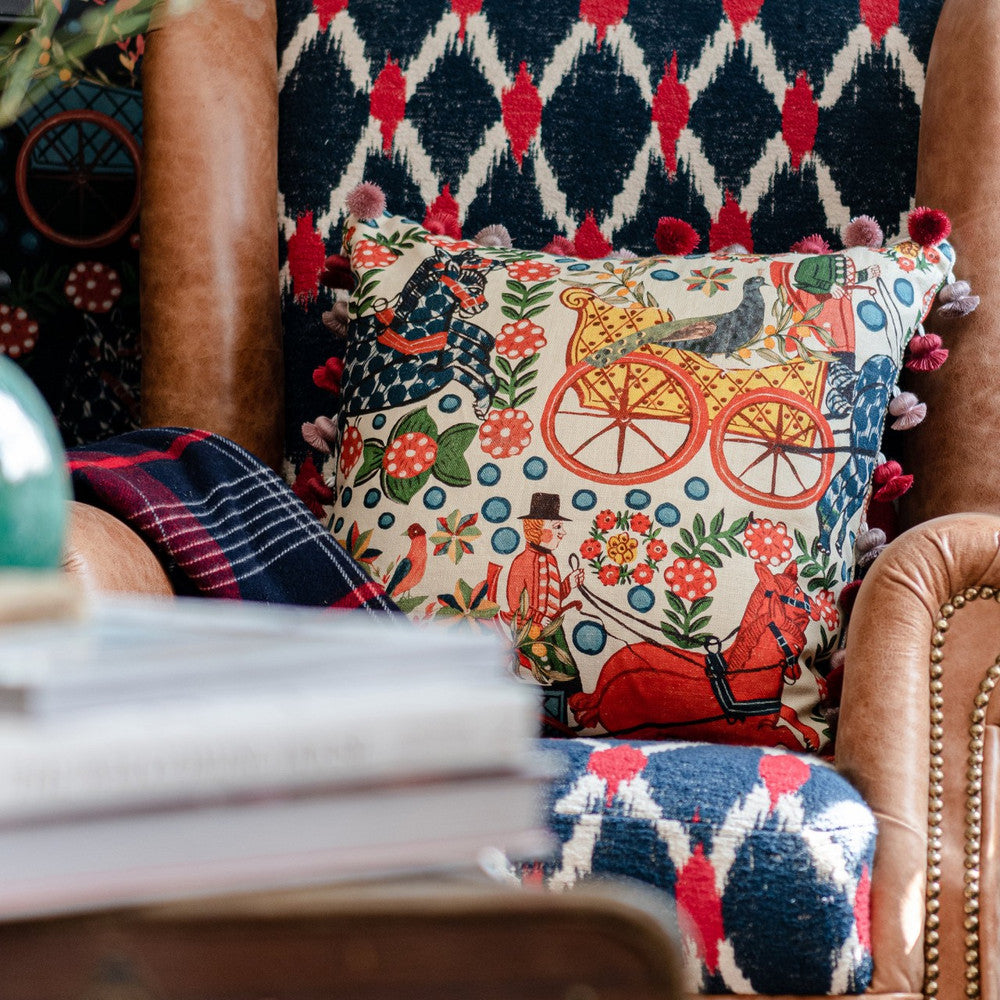 Fasnacht Cushion by Mind the Gap Designer Pillow TYROL APRES-SKI HOME COLLECTION 100% Linen, printed and stonewashed Made in Romania Fringes all around 20 x 20 in - Swanky Fabrics -