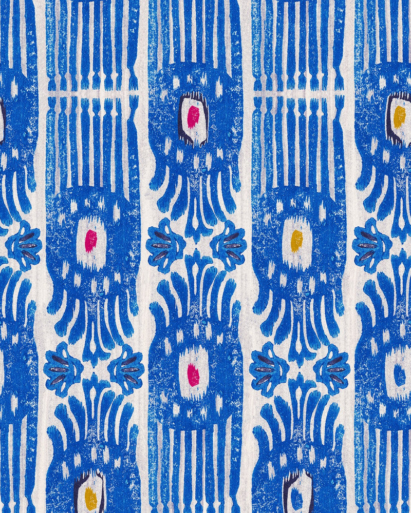 Mind The Gap Wallpaper IKAT Carnival Wallpaper (WP20817) | WP20817 | MINNIE KEMP X MINDTHEGAP | 1 roll x 20.47 x 354.33 in | 0.52m / 20.5in | 9m / 354in | 4.68mp | 70cm / 27.6in | Blue, Red, White, Yellow | Non-woven | Paste the wall | 1-roll in a box | Fabric Carolina | https://www.fabriccarolina.com/