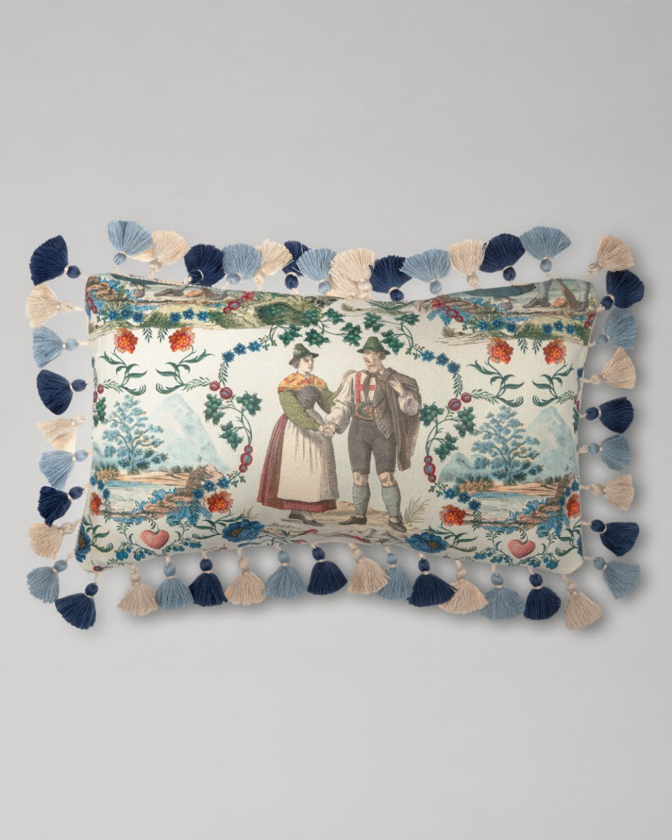 LANDHAUSMODE Cushion - Rectangular (LC40198) by Mind The Gap | LC40198 | TYROL APRES-SKI | 50 x 30 cm | Blue, White, Green, Red | Fringes all around | Duck feather | 56% Cotton, 44% Linen | Fabric Carolina | https://www.fabriccarolina.com/
