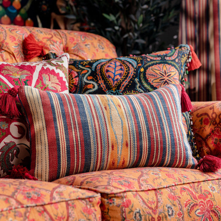 Neyshabour Cushion by Mind the Gap Designer Pillow WOODSTOCK '69 LIFESTYLE COLLECTION 64% Cotton, 27% Viscose, 9% Linen Made in Romania Red tassels 20 x 12 in - Swanky Fabrics -