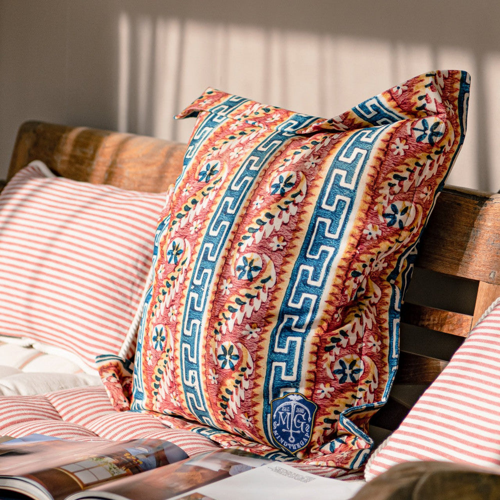 Mind The Gap Pillows SAMOTHRAKI Outdoor Cushion (LC40125) | LC40125 | SUNDANCE VILLA | 20 x 20 in | Blue, Orange, Yellow | Fabric Carolina | https://www.fabriccarolina.com/