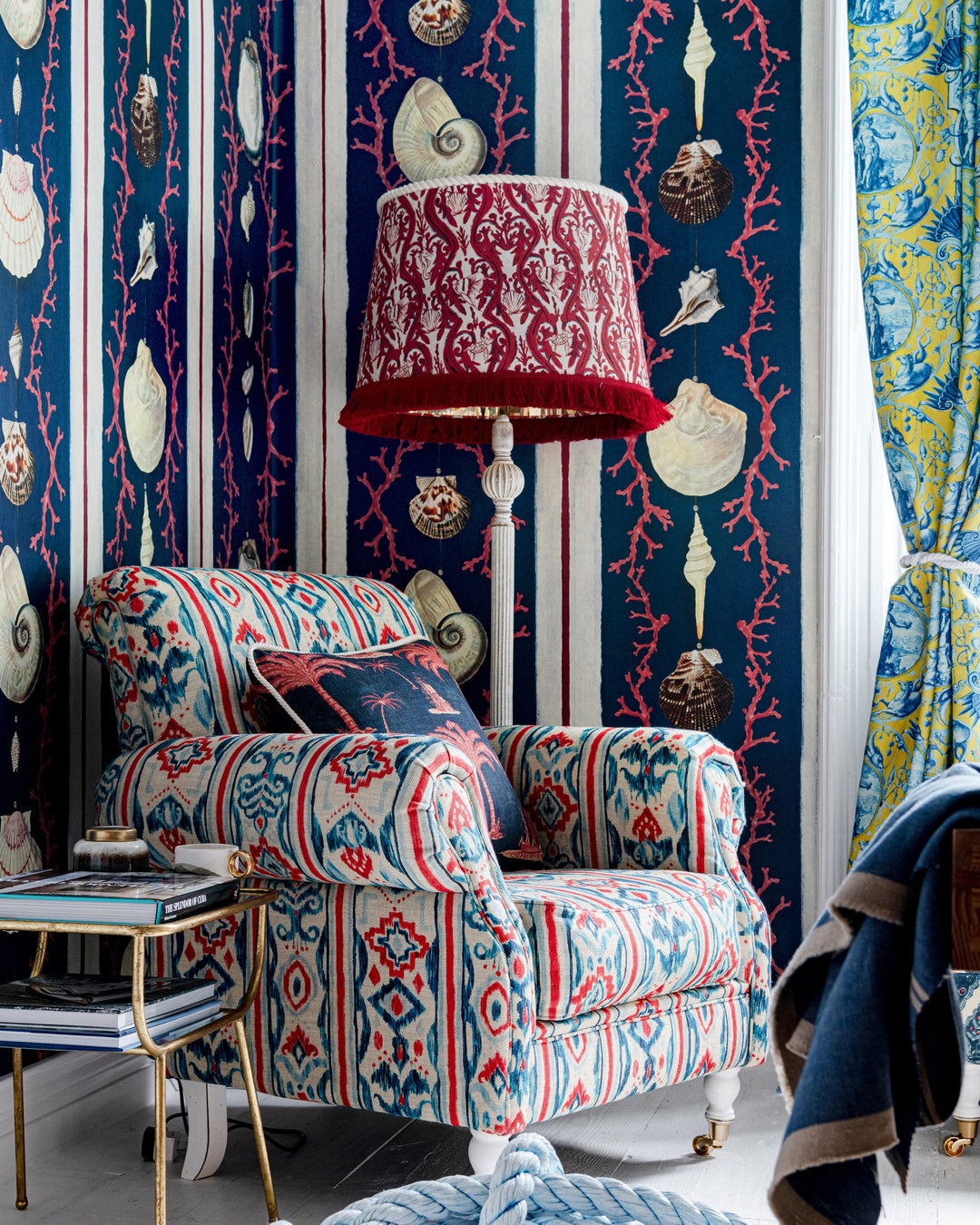 COQUILLAGE Samba Red Wallpaper (WP20573) by Mind The Gap | WP20573 | SUNDANCE VILLA | 3 rolls x 52x300 cm / 20.5x118.1 in | 0.52m / 20.5in | 3m / 118in | 4.65sqm / 50sq ft | 100cm / 39.3in | Blue, White, Red | Non-woven Textured | Paste the wall | 3-rolls in a box | Fabric Carolina | https://www.fabriccarolina.com/