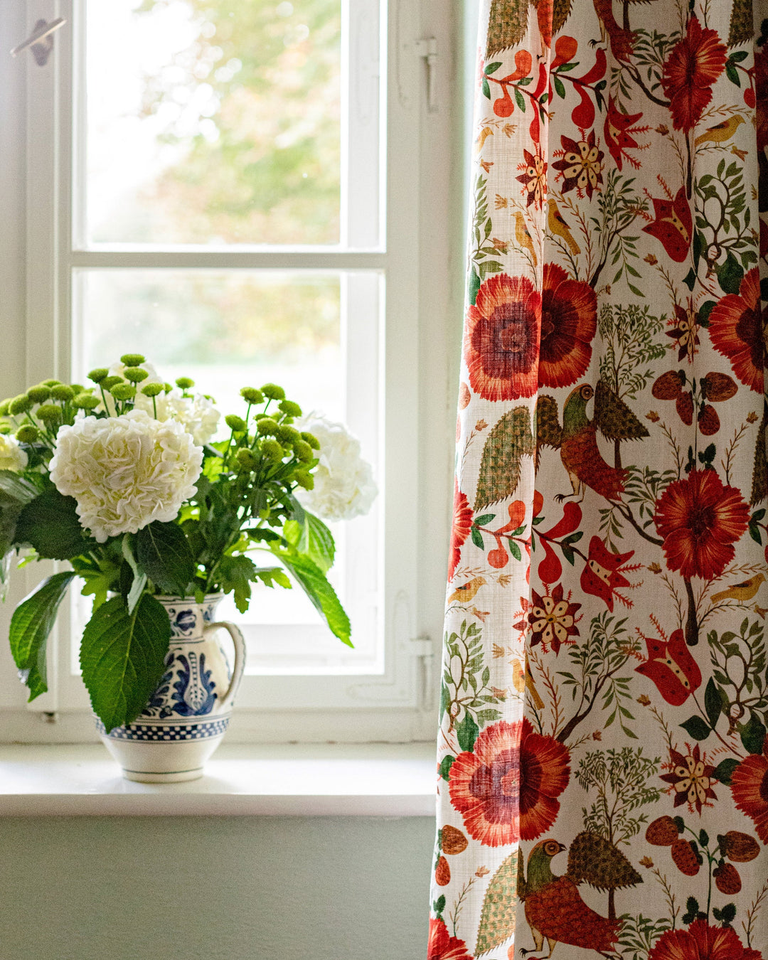 Szekely Folk linen fabric by Mind the Gap (FB00040), curtain room setting